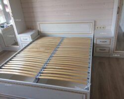 Кровать на заказ с фрезеровкой на фасаде в классическом стиле МКН Мебель